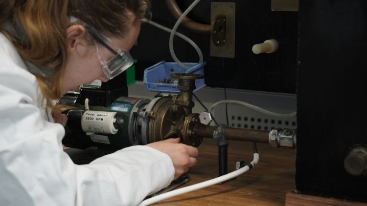 A student in a Chemical Engineering and Biotechnology practical session