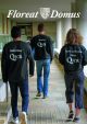Three people walking with QJCR sweaters